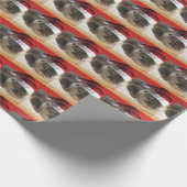 Sleepy Otter mit einem Weihnachtshut Geschenkpapier (Ecke)