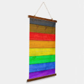SlipperyJoe's Inclusive Gay Pride Flag strukturier Wandteppich Mit Holzrahmen (Gewinkelt)