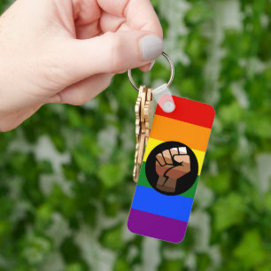 SlipperyJoes Regenbogenflagge mit erhobener Faust Schlüsselanhänger