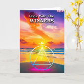 Slogan Beach bei Sonnenaufgang mit den OM der WINN Karte (Gelbe Blume)