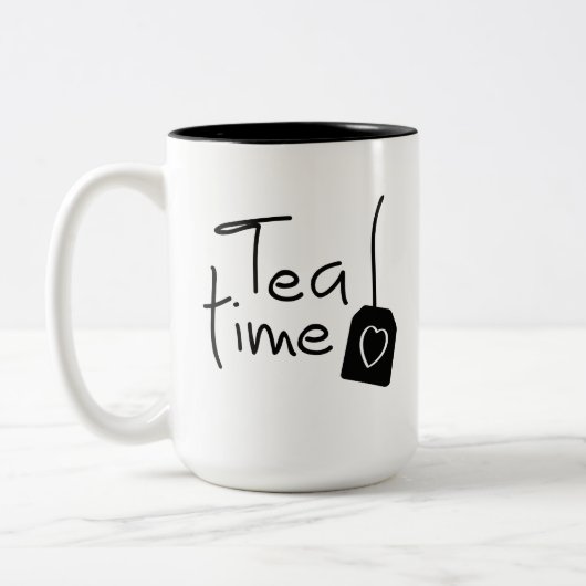 Slogan tea time - theetijd. kopje thee drinken. zweifarbige tasse (Links)