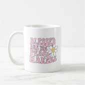 Slogan von Daisy and Peace Makers Kaffeetasse (Links)