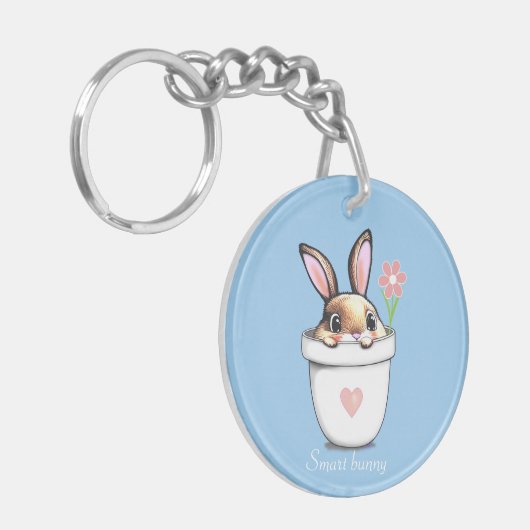 Smart Bunny mit Blume & Herz auf Light Blue Schlüsselanhänger (Vorderseite links)