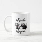Smile Squad mit lustigem Katzen-Design Kaffeetasse (Links)