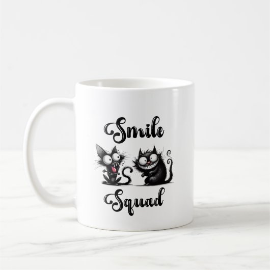 Smile Squad mit lustigem Katzen-Design Kaffeetasse (Links)