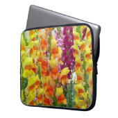 Snapdragons farbenfrohe Blüte Laptopschutzhülle (Vorderseite Links)