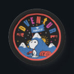 Snoopy Adventure Awaits Graduation Mountain Design Pappteller<br><div class="desc">Celebrate adventure and imagination with this bold and playful Snoopy-inspired design featuring a charming explorer pup ready to take on the great outdoors. Set against a dramatic black background with a vibrant red border, the scene showcases snowy mountain peaks, a rising sun, and a rolled sleeping bag, creating a fun...</div>