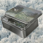 Snow at Argenteuil by Claude Monet Puzzle<br><div class="desc">Snow at Argenteuil II (1874) by Claude Monet is a vintage impressionist fine art landscape painting. A winter day featuring a snow scene with trees and houses in the background in the city of Argenteuil, France. About the artist: Claude Monet (1840-1926) was a founder of the French impressionist painting movement...</div>