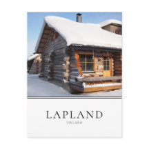 Snow-covered log cabin Lapland, Finland