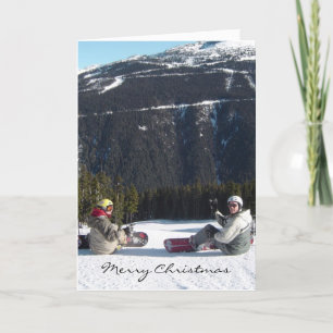 Snowboarder mit einem landschaftlich schönen Bergb Feiertagskarte