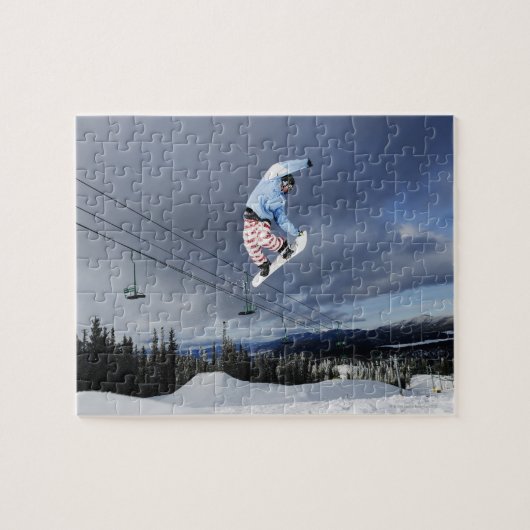 Snowboarder springen in der Luft und machen eine H Puzzle (Horizontal)