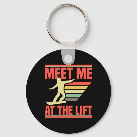 Snowboarder versorgt Snowboarder mit dem Snowboard Schlüsselanhänger (Vorderseite)