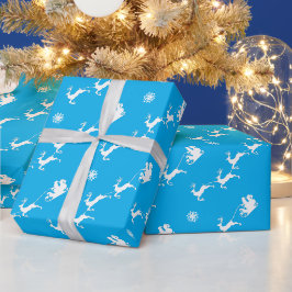 Snowflake und Santa mit Schlitten auf dem BLAU Geschenkpapier