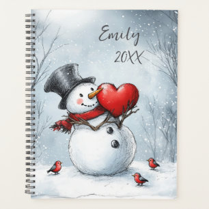 Snowman bietet Liebe mit einem großen Herz Planer