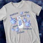 Snowman Dreidels Funny 8 Crazy Nights Hanukkah<br><div class="desc">Personalisieren Sie diesen lustigen Hanukkah T - Shirt als niedliches Geschenk oder vielleicht für sich selbst! Ein glücklicher jüdischer Schneemann weht im Zentrum des Designs hallo, mit sieben passenden blauen und lila dreidimensionalen Drähten unterschiedlicher Größe tanzen um ihn herum. Unter den dreiköpfigen sind Wörter in einem dunkelblauen, handgeschriebenen Schriftart untergebracht:...</div>
