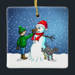 Snowman Gebäude Keramikornament<br><div class="desc">Der Junge hat einen Schneemann gebaut,  auf dem sein Hund steht und uriniert,  während der Junge dem Schneemann eine Karottennaase gibt.</div>