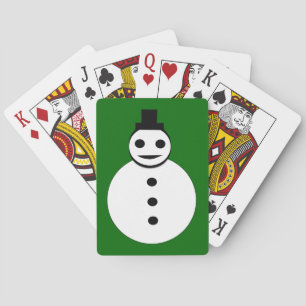 Snowman lächelt Weihnachten und spielt Karten Spielkarten