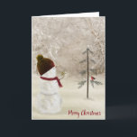 Snowman mit einem Weihnachts-Gold-Star Feiertagskarte<br><div class="desc">Ein niedlicher Schneemann mit Strumpf und Schal trägt einen Goldstar für einen alten Kiefer. Alle Texte können geändert werden.</div>