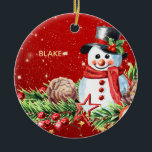 Snowman Top Hat - Baby Keepake Personalisiert Keramik Ornament<br><div class="desc">Mit dem Snowman-Ornament Lächeln lassen Sie Ihre Feriendekorationen mit wahrem Charme verzaubern! Dieses festliche Design besticht durch einen zauberhaften Wasserfarbenschneemann, der einen klassischen schwarzen Hut mit rotem Band und heilige Blätter mit Beeren trägt. Sein fröhlicher, roter Muffler, sein Gesenkkörper und sein warmes Lächeln sind umgeben von einer schönen Anordnung von...</div>