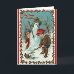 Snowman und Snowballs Weihnachtskarte des Jahrgang Feiertagskarte<br><div class="desc">Diese Urlaubskarte zeigt ein wunderschönes Vintages Kunstbild von zwei Jungs, die im Schnee spielen. Ein Junge ist glücklich, ein Schneemann zu Gebäude, der andere macht Schneebälle! Das Bild ist in Rot gerahmt. Auf der Vorderseite der Karte steht "Frohe Weihnachten", und der Innentext ist vollständig anpassbar. Sie können es verlassen, wie...</div>
