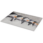 Snowmen nah oben in einer Reihe Schneidebrett (Ecke)