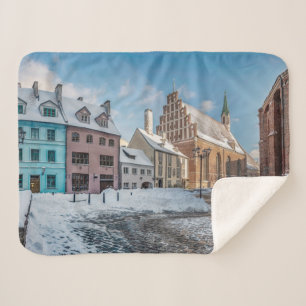 Snowy winter city centre in Riga, Lettland Sherpadecke