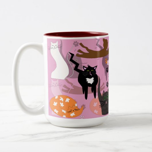 So unterschiedliche Katzen. Zweifarbige Tasse (Links)