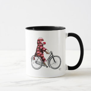 Sock Monkey auf dem Fahrrad Tasse