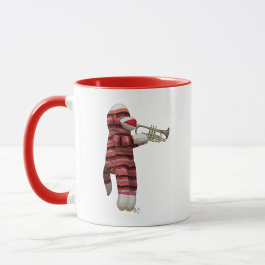 Sock Monkey spielt Trumpet Tasse (Links)