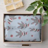 Sockenaffe mit Weihnachtsmannmütze auf Blue Christ Seidenpapier (Geschenk)