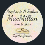 Soft Pastel Spring Wedding Gefallen Stickers<br><div class="desc">Die sanftesten Wirbel von Rosa und Gelb schaffen schöne Frühjahrsheirat Gunst Sticker. Zwei Hochzeitsringe am unteren Ende des Hochzeitsaufklebers schweben für immer über dem Satz zusammen. Die Braut und Bräutigam zuerst Namen und dann ihr gemeinsamer Nachname ist oben. Ein schöner Weg, um Ihre Gastgeschenk Hochzeit Taschen, Hochzeit Kuchen Boxen oder...</div>