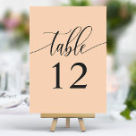 Soft Peach Minimalistisch Calligrafy Wedding Tischnummer<br><div class="desc">Mit diesen eleganten, zarten pfirsichfarbenen Tischnummern führen Sie Ihre Gäste zu ihren Sitzplätzen. Diese Tischnummern mit minimalistischem Design und moderner Kalligraphie fügen Ihrem Hochzeitsempfang eine Touch von Eleganz hinzu. Der weiche Hintergrund und die gepflegte, elegante Typografie sorgen für eine einfache Lesbarkeit bei gleichzeitig verstärkter Hochzeitsdekoration. Diese Tischnummern sind perfekt für...</div>