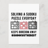 Solving a sudoku puzzle a everyday postkarte (Vorderseite)