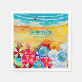 Sommerschirme auf dem Sand Serviette