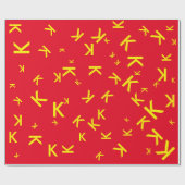 Sonderbuchstabe K - gelber Anfangsname auf rot Geschenkpapier (Flach)