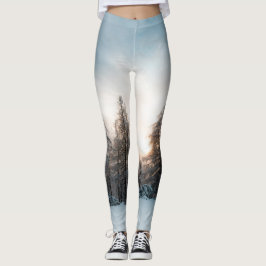 Sonne hinter Fichtenbäumen Leggings