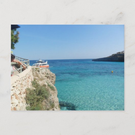 Sonne, Meer und ein kleines orangefarbenes Boot Postkarte (Vorderseite)