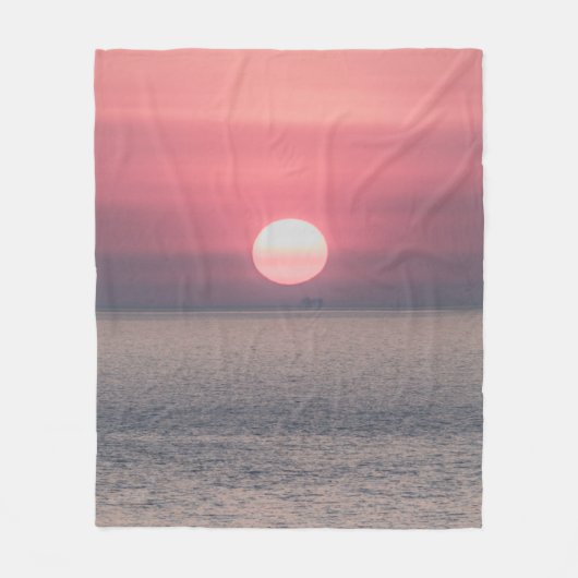 SONNE UNTERGEHT AM MEERESHORIZONT FLEECEDECKE (Vorderseite)