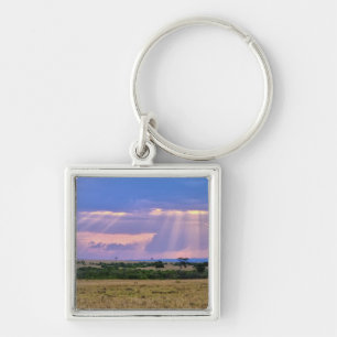 Sonne untergeht auf dem Masai Mara. Schlüsselanhänger