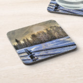 Sonnenaufgang auf einer Winterweide im Schnee Untersetzer (Linke Seite)