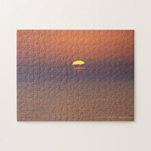 Sonnenaufgang auf See Puzzle