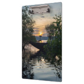 Sonnenaufgang des Fischereibootes Klemmbrett (Links)
