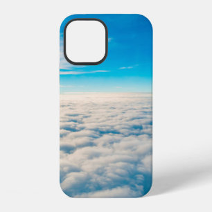 Sonnenaufgang über den Wolken aus dem Flugzeugfens iPhone 12 Hülle