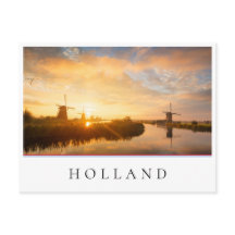 Sonnenaufgang über Windmühlen und einem Fluss in H