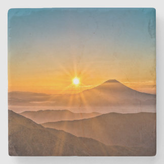 Sonnenaufgang zwischen den Hügeln Steinuntersetzer