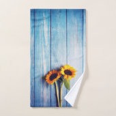 Sonnenblume an der blauen Holzwand Badhandtuch Set (Handtuch)
