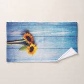 Sonnenblume an der blauen Holzwand Badhandtuch Set (Handtuch)