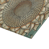 Sonnenblume blühen auf blaugrünem Hintergrund Schneidebrett (Ecke)