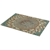 Sonnenblume blühen auf blaugrünem Hintergrund Schneidebrett (Ecke)