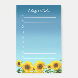 Sonnenblumen auf himmelblauen Dingen, die zu tun s Post-it Klebezettel